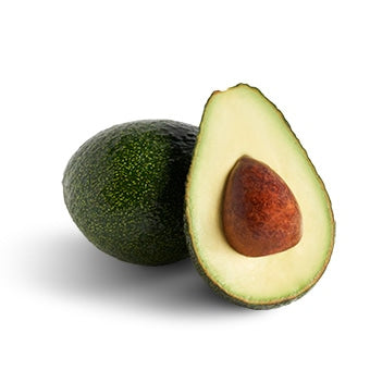Whole and half Gem avocado on a white background