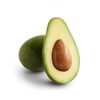 Zutano Avocado with one half sliced open on a white background